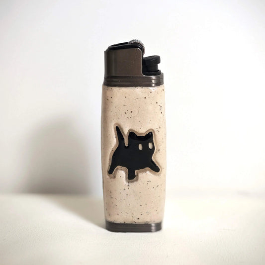 Ceramic lighter case with black cat design from Mellow Sora on white background