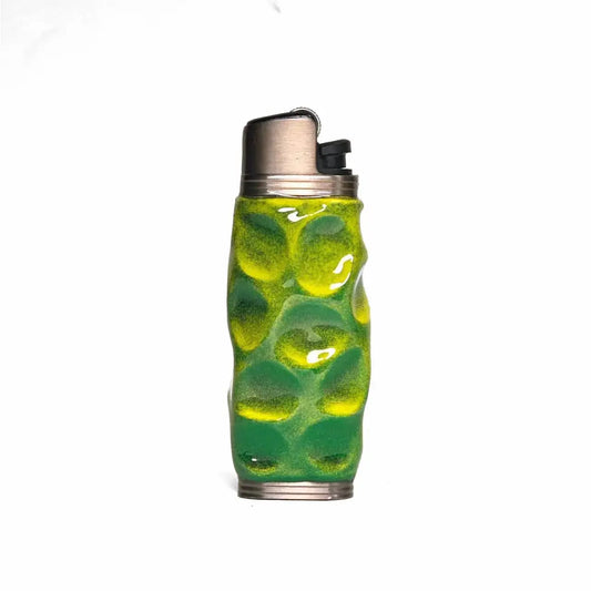 Green and yellow textured lighter case with a metallic top, Mellow Sora accessory