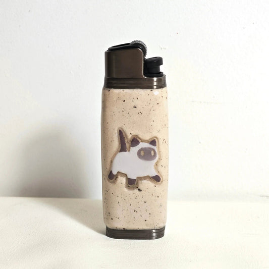 Ceramic lighter case with cat design from Mellow Sora on a white background