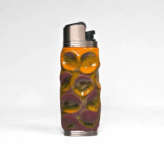 Textured ceramic lighter case with orange and maroon glaze by Mellow Sora, front view