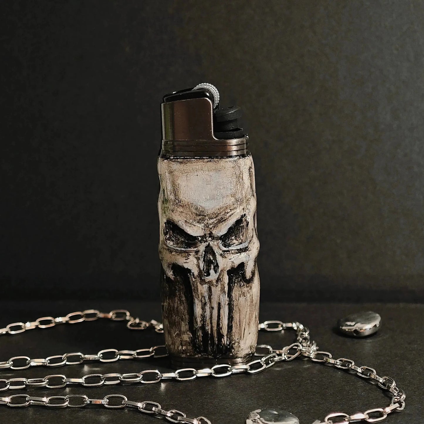 Skull design lighter case with silver chain, unique accessory from Mellow Sora