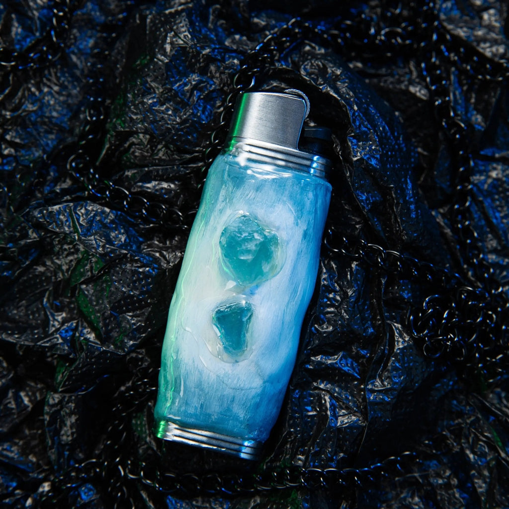 Mellow Sora artistic lighter case with aqua stones on textured black background