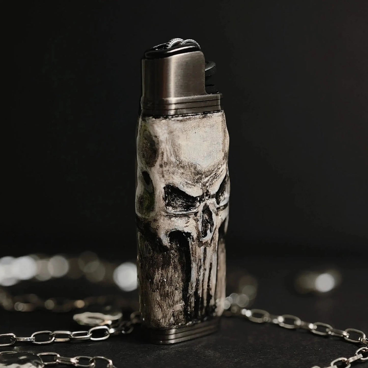 Handcrafted skull lighter case with metallic details on a chain, Mellow Sora accessory