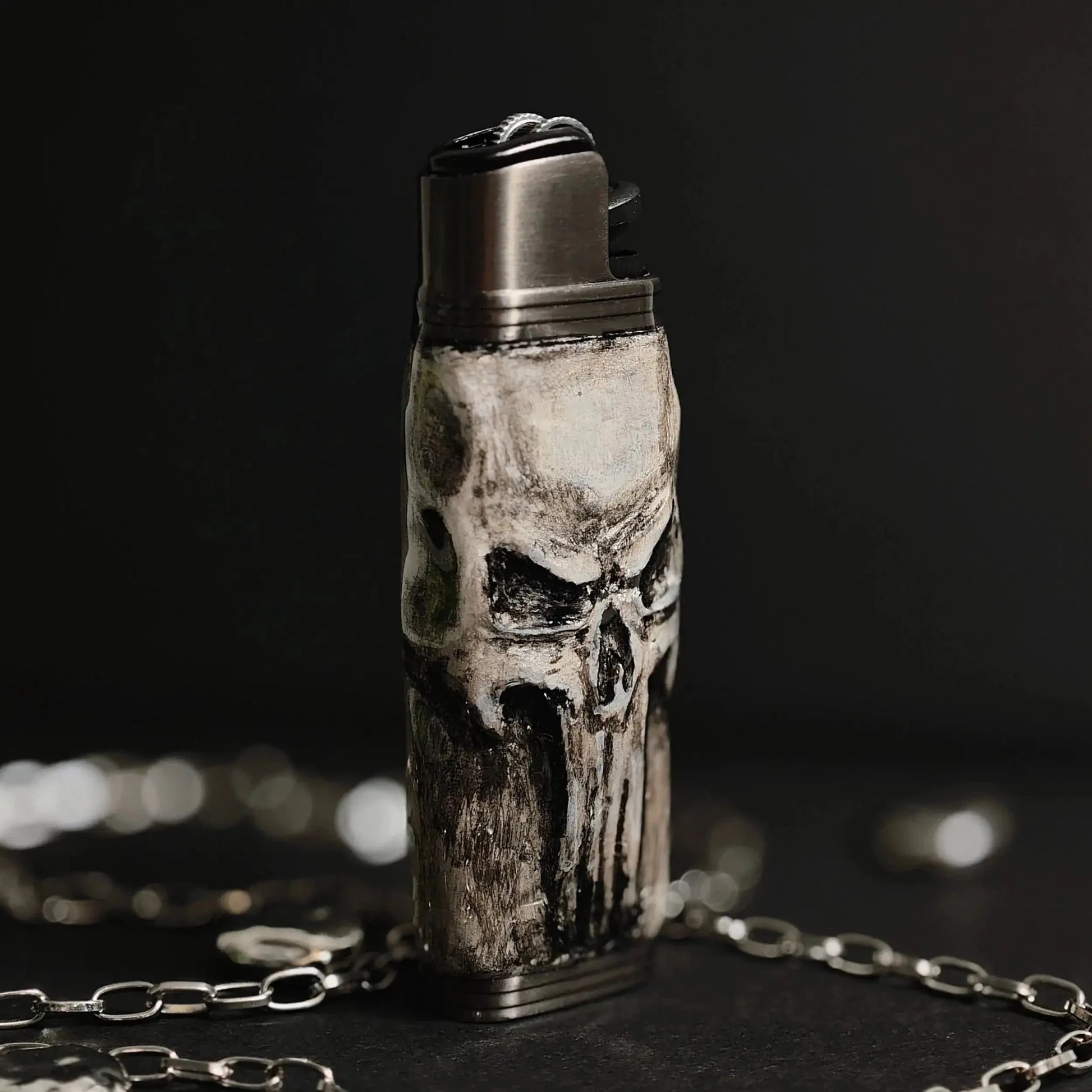 Handcrafted skull lighter case with metallic details on a chain, Mellow Sora accessory