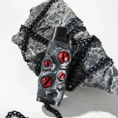 Unique dragon eye lighter case with red accents on black rock and chain, Mellow Sora accessory