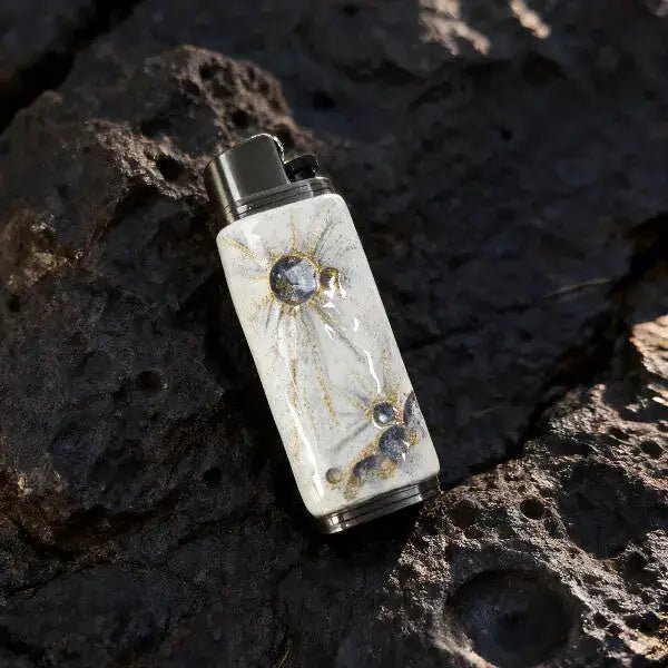 Artistic white and gold lighter case with spark design on stone, Mellow Sora accessory