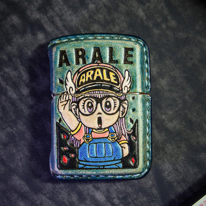 Arale anime-themed leather lighter case on textured surface, Mellow Sora accessory