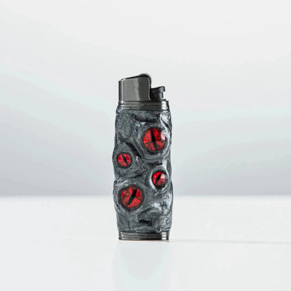 Unique Mellow Sora lighter case with textured gray surface and red gem accents